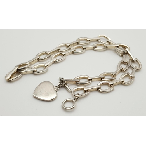 289 - An attractive Solid Silver 925 Chunky Necklace, T Bar Heart Tag, 41 grams, 41cm. In excellent condit... 