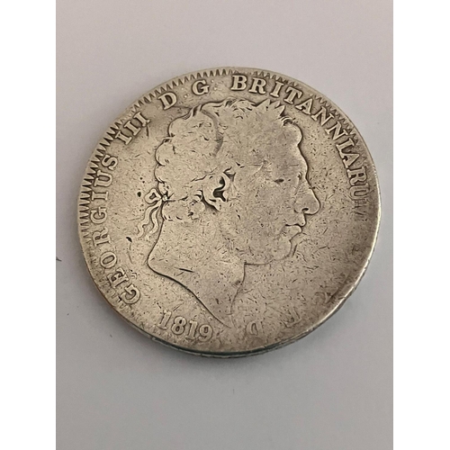 322 - 1819 GEORGE III SILVER CROWN. Fair condition.