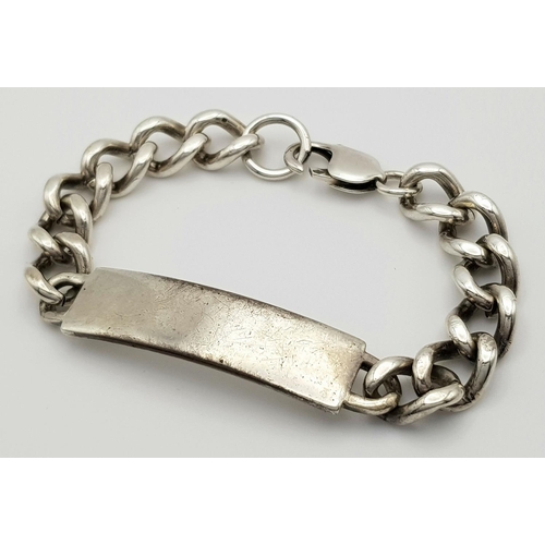 325 - A Chunky Vintage Solid Silver 925 ID Bracelet, 48 grams, 20cm. In good condition.