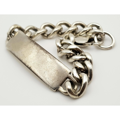 325 - A Chunky Vintage Solid Silver 925 ID Bracelet, 48 grams, 20cm. In good condition.