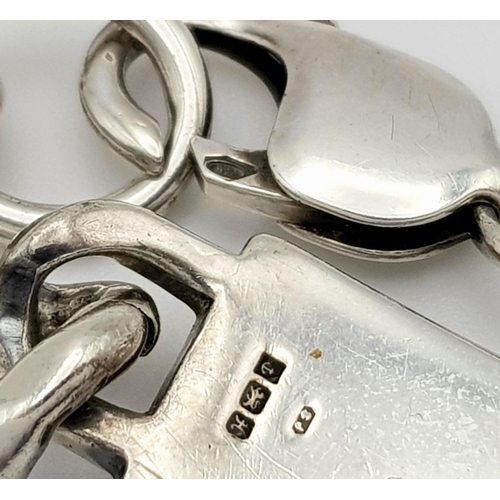 325 - A Chunky Vintage Solid Silver 925 ID Bracelet, 48 grams, 20cm. In good condition.