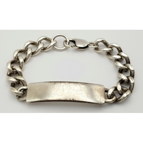 325 - A Chunky Vintage Solid Silver 925 ID Bracelet, 48 grams, 20cm. In good condition.