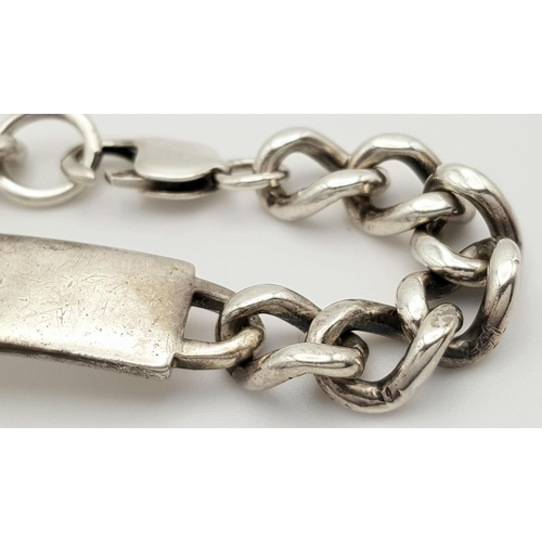 325 - A Chunky Vintage Solid Silver 925 ID Bracelet, 48 grams, 20cm. In good condition.