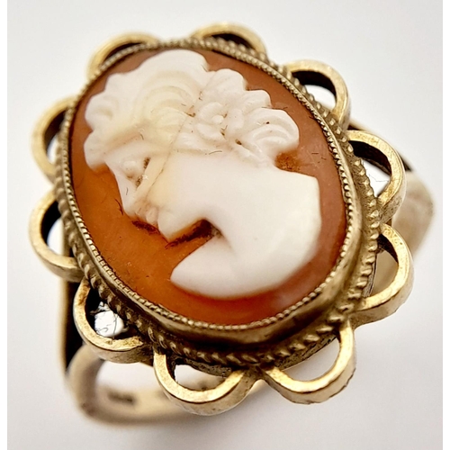 392 - Vintage 9 CARAT GOLD CAMEO RING. Having coffee and cream coloured Cameo, set to centre with lovely l... 