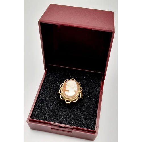 392 - Vintage 9 CARAT GOLD CAMEO RING. Having coffee and cream coloured Cameo, set to centre with lovely l... 