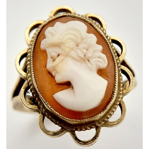 392 - Vintage 9 CARAT GOLD CAMEO RING. Having coffee and cream coloured Cameo, set to centre with lovely l... 