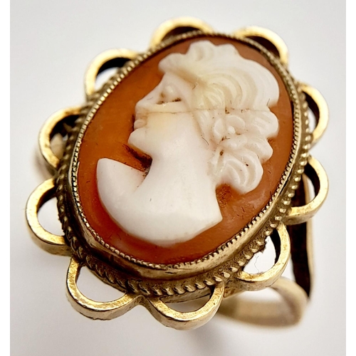 392 - Vintage 9 CARAT GOLD CAMEO RING. Having coffee and cream coloured Cameo, set to centre with lovely l... 