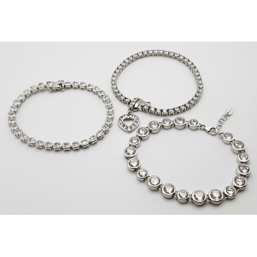 408 - Three Elegant Solid Silver 925 Tennis Bracelets, with Sparkling White Stones (possibly Cubic Zirconi... 