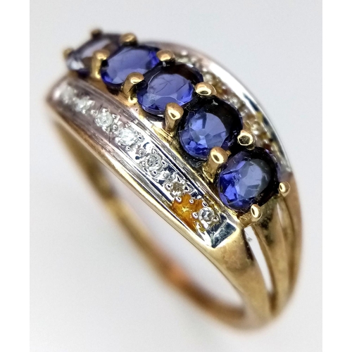 413 - Impressive 9 carat GOLD RING, set with DIAMONDS and TANZANITE Coloured GEMSTONES. Fully hallmarked.2... 