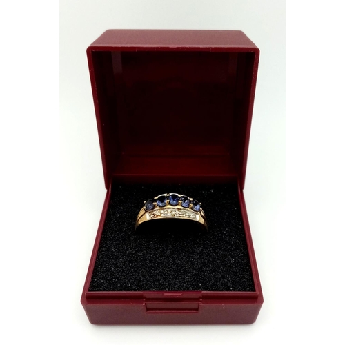 413 - Impressive 9 carat GOLD RING, set with DIAMONDS and TANZANITE Coloured GEMSTONES. Fully hallmarked.2... 