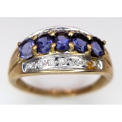 413 - Impressive 9 carat GOLD RING, set with DIAMONDS and TANZANITE Coloured GEMSTONES. Fully hallmarked.2... 