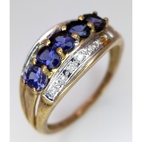 413 - Impressive 9 carat GOLD RING, set with DIAMONDS and TANZANITE Coloured GEMSTONES. Fully hallmarked.2... 