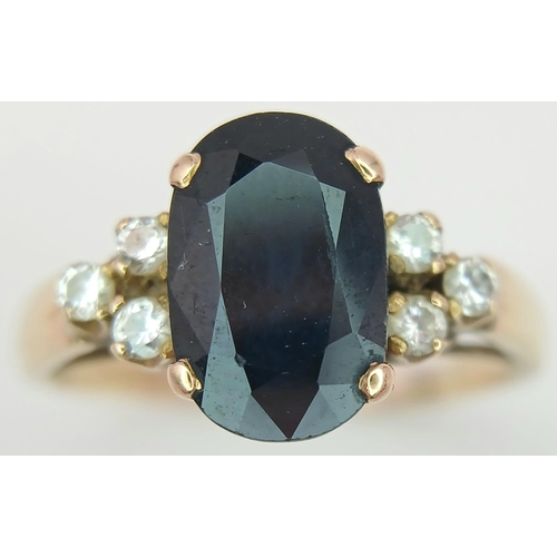 49 - Impressive 18 carat GOLD, DIAMOND and SPINEL RING. Consisting large oval cut SPINEL mounted to centr... 