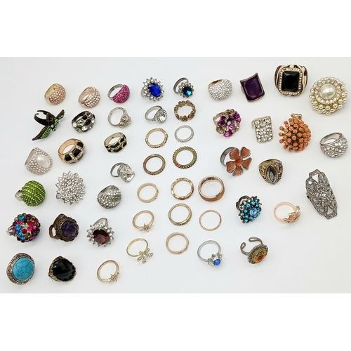 504 - An enormous selection of better quality DRESS RINGS. Mainly jewelled with many extremely large and f... 