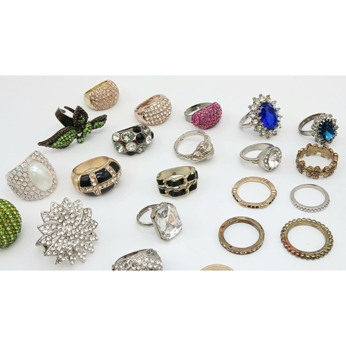 504 - An enormous selection of better quality DRESS RINGS. Mainly jewelled with many extremely large and f... 