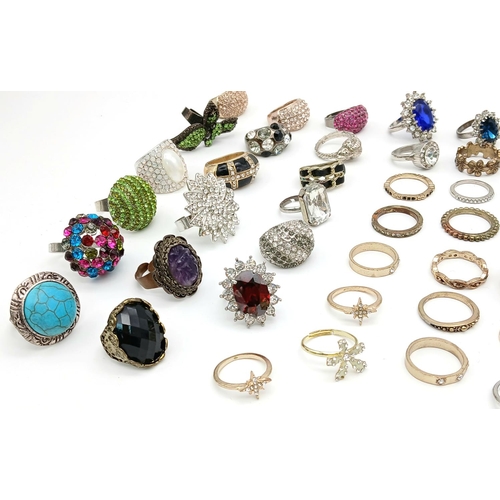 504 - An enormous selection of better quality DRESS RINGS. Mainly jewelled with many extremely large and f... 