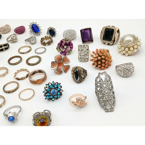 504 - An enormous selection of better quality DRESS RINGS. Mainly jewelled with many extremely large and f... 