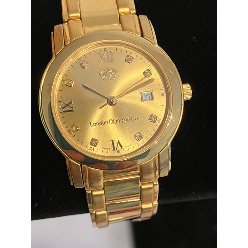 581 - London Diamond company 18 CARAT GOLD PLATED QUARTZ WRISTWATCH. Mid-size with 8 x DIAMONDS set into t... 