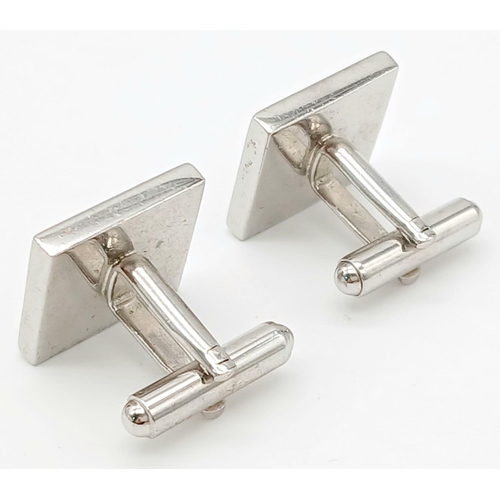 616 - Genuine pair of PAUL SMITH CUFFLINKS. Having iconic chequered fronts with torpedo backs. Excellent c... 