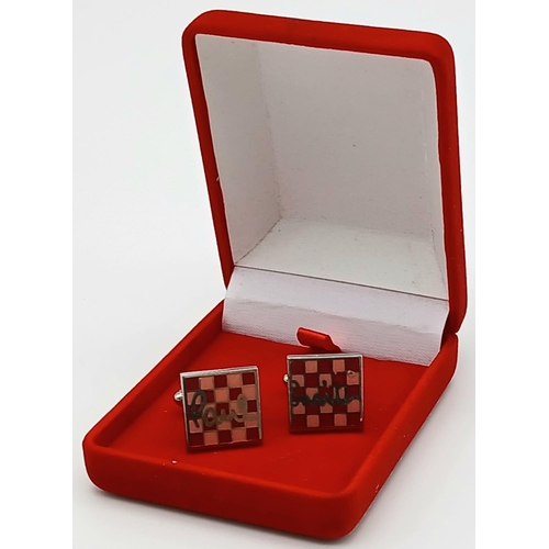 616 - Genuine pair of PAUL SMITH CUFFLINKS. Having iconic chequered fronts with torpedo backs. Excellent c... 