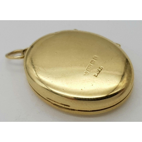 788 - A Vintage 9K Yellow Gold Oval Locket. 2.2cm. 2.55 grams.