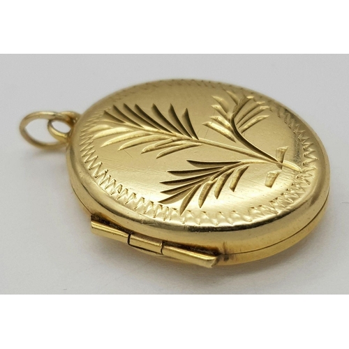 788 - A Vintage 9K Yellow Gold Oval Locket. 2.2cm. 2.55 grams.