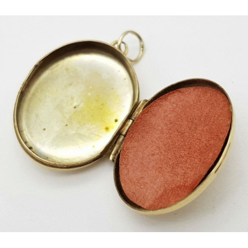 788 - A Vintage 9K Yellow Gold Oval Locket. 2.2cm. 2.55 grams.