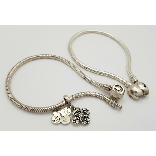 823 - Two Chamilia Charm Bracelets, Solid Silver 925, Total weight: 32 grams, Both 19cm. In excellent cond... 