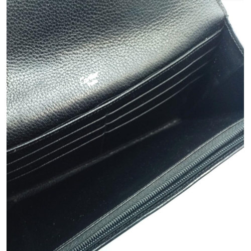 113 - A Cartier Black Purse/Wallet. Snake, leather and patent leather exterior with silver-toned hardware ... 