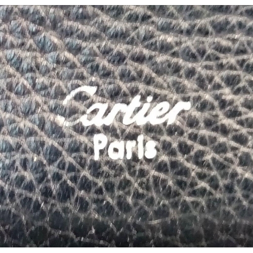 113 - A Cartier Black Purse/Wallet. Snake, leather and patent leather exterior with silver-toned hardware ... 