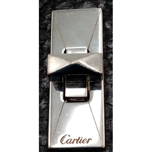 113 - A Cartier Black Purse/Wallet. Snake, leather and patent leather exterior with silver-toned hardware ... 