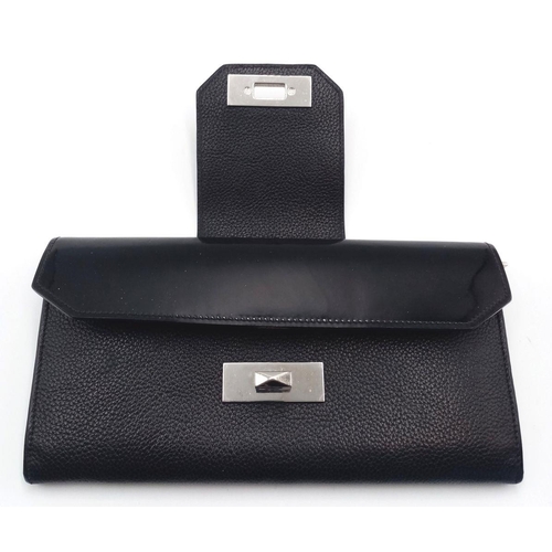 113 - A Cartier Black Purse/Wallet. Snake, leather and patent leather exterior with silver-toned hardware ... 