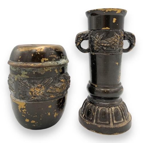 1560 - A Pair of Antique Asian Bronze Vases, with floral relief designs. Exhibits wear and patina with scat... 