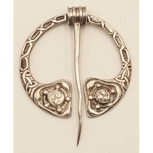 1119 - A Sterling Silver Scottish Peannular Brooch. 4.5cm.