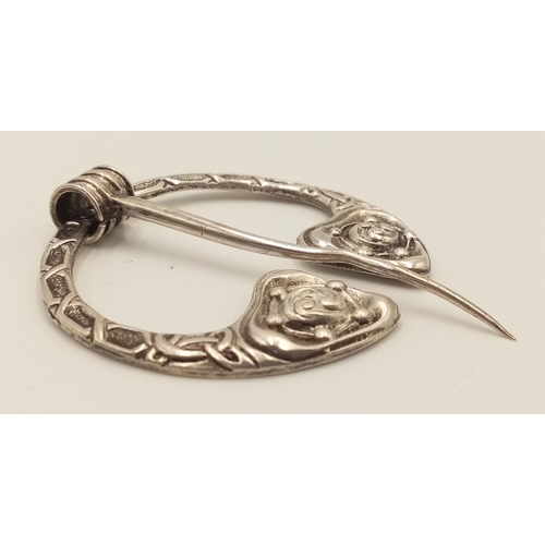 1119 - A Sterling Silver Scottish Peannular Brooch. 4.5cm.