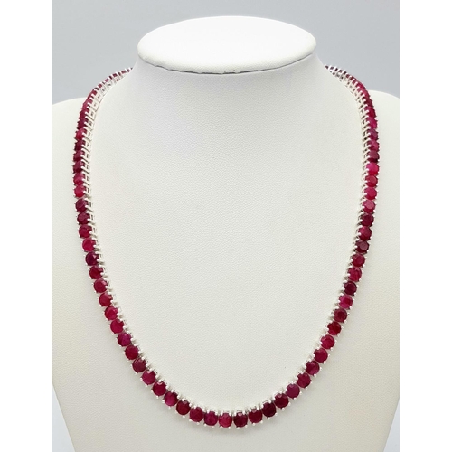 149 - A Ruby Gemstone Tennis Necklace. Set in 925 Silver. CD 1514. 42cm.