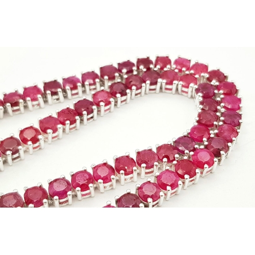 149 - A Ruby Gemstone Tennis Necklace. Set in 925 Silver. CD 1514. 42cm.