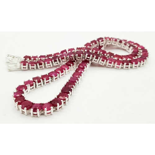 149 - A Ruby Gemstone Tennis Necklace. Set in 925 Silver. CD 1514. 42cm.