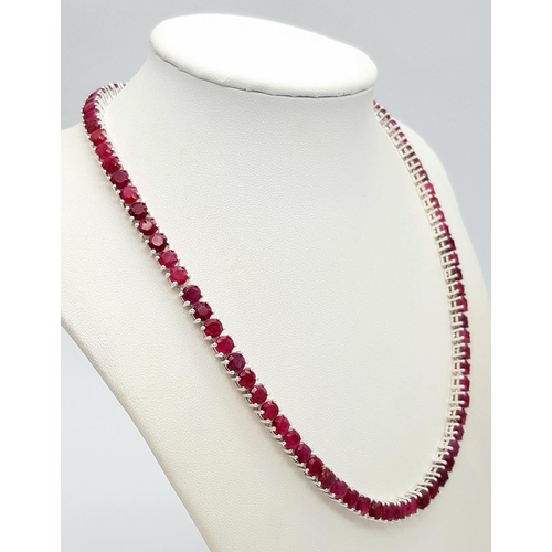 149 - A Ruby Gemstone Tennis Necklace. Set in 925 Silver. CD 1514. 42cm.