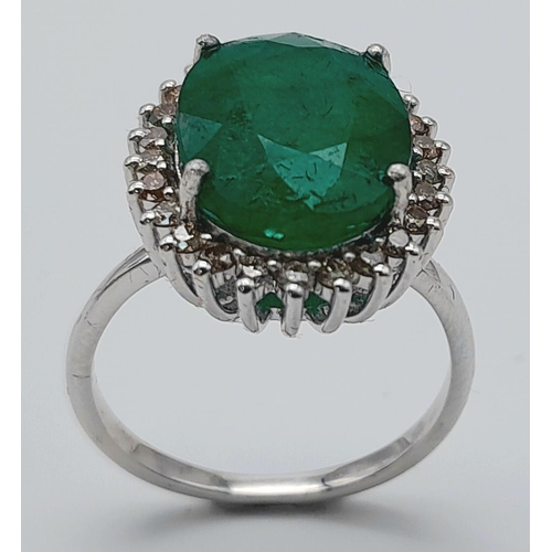 156 - A 6ct Emerald Gemstone Ring with Diamond Accents. Diamonds -  approx 0.45ctw. Set in 925 Silver. Siz... 