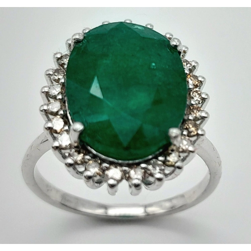 156 - A 6ct Emerald Gemstone Ring with Diamond Accents. Diamonds -  approx 0.45ctw. Set in 925 Silver. Siz... 