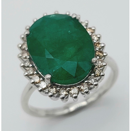 156 - A 6ct Emerald Gemstone Ring with Diamond Accents. Diamonds -  approx 0.45ctw. Set in 925 Silver. Siz... 