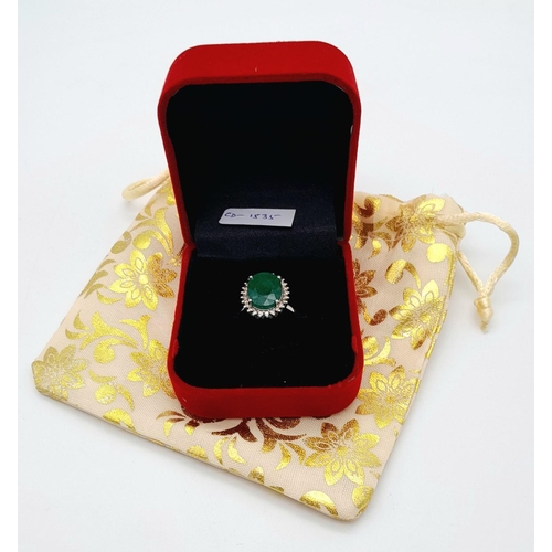 156 - A 6ct Emerald Gemstone Ring with Diamond Accents. Diamonds -  approx 0.45ctw. Set in 925 Silver. Siz... 