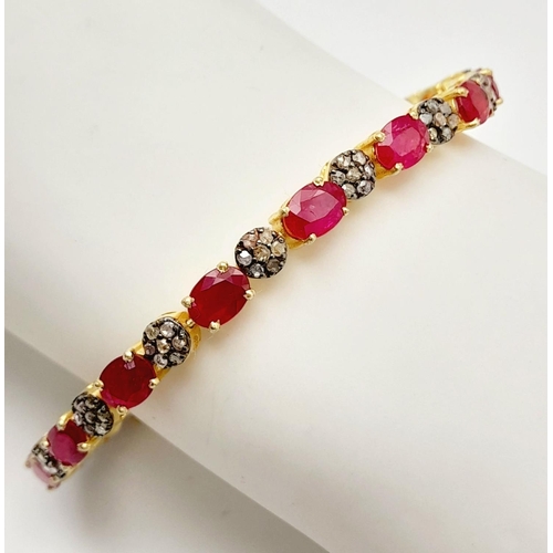 163 - An Oval Cut Ruby and Diamond Gemstone Tennis Bracelet. Set in 925 gilded Silver. Diamonds - approx 1... 