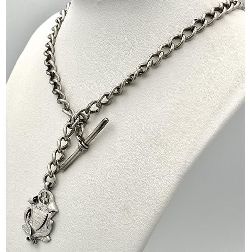 426 - An Antique Sterling Silver Double Albert Chain with Fob. 26cm. 48g