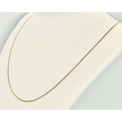 567 - Long 9 CARAT GOLD fine Chain LINK NECKLACE.  0.9 grams. 50 cm.(20”).