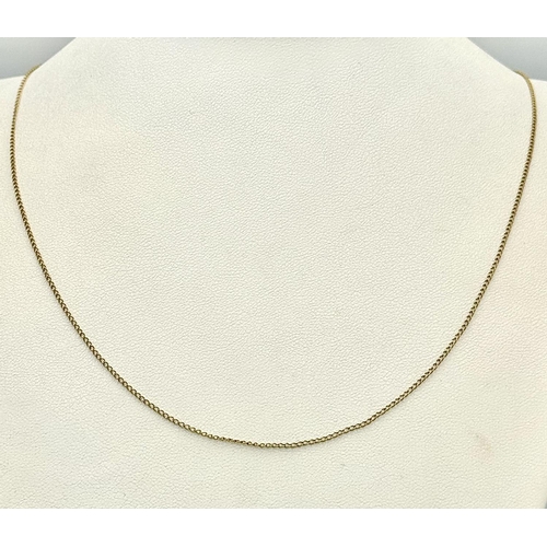 567 - Long 9 CARAT GOLD fine Chain LINK NECKLACE.  0.9 grams. 50 cm.(20”).