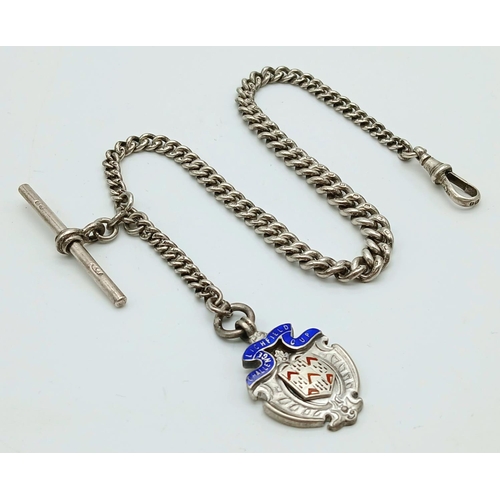 578 - An Antique Sterling Silver Albert Chain with Fob. 33cm. 36.6g.