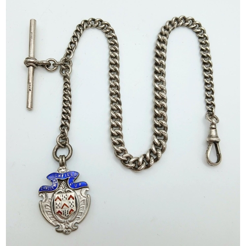 578 - An Antique Sterling Silver Albert Chain with Fob. 33cm. 36.6g.