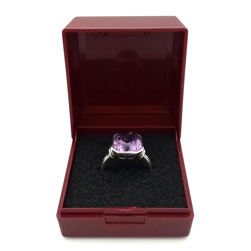 595 - Impressive Italian SILVER RING set with large (4 carat) Octagonal Cut AMETHYST . Complete with ring ... 